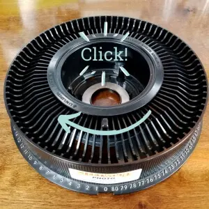 Slide carousel with lock ring clicked into place to secure slides before transport or scanning