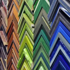 Stacked corner samples of colorful custom picture frame mouldings