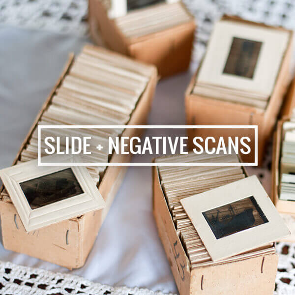 Boxes of photographic slides and negatives prepared for scanning and digitizing