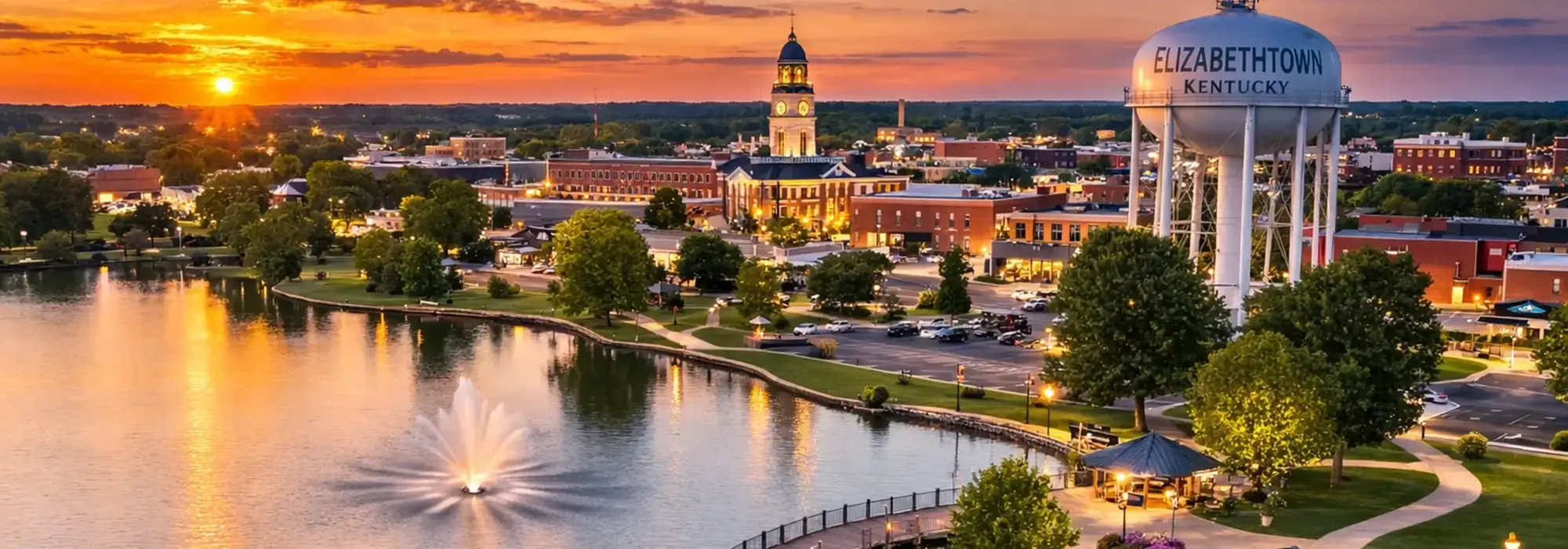 Wide recognizable Elizabethtown header image showing Freeman Lake Park or a drone-style lake view associated with Elizabethtown.