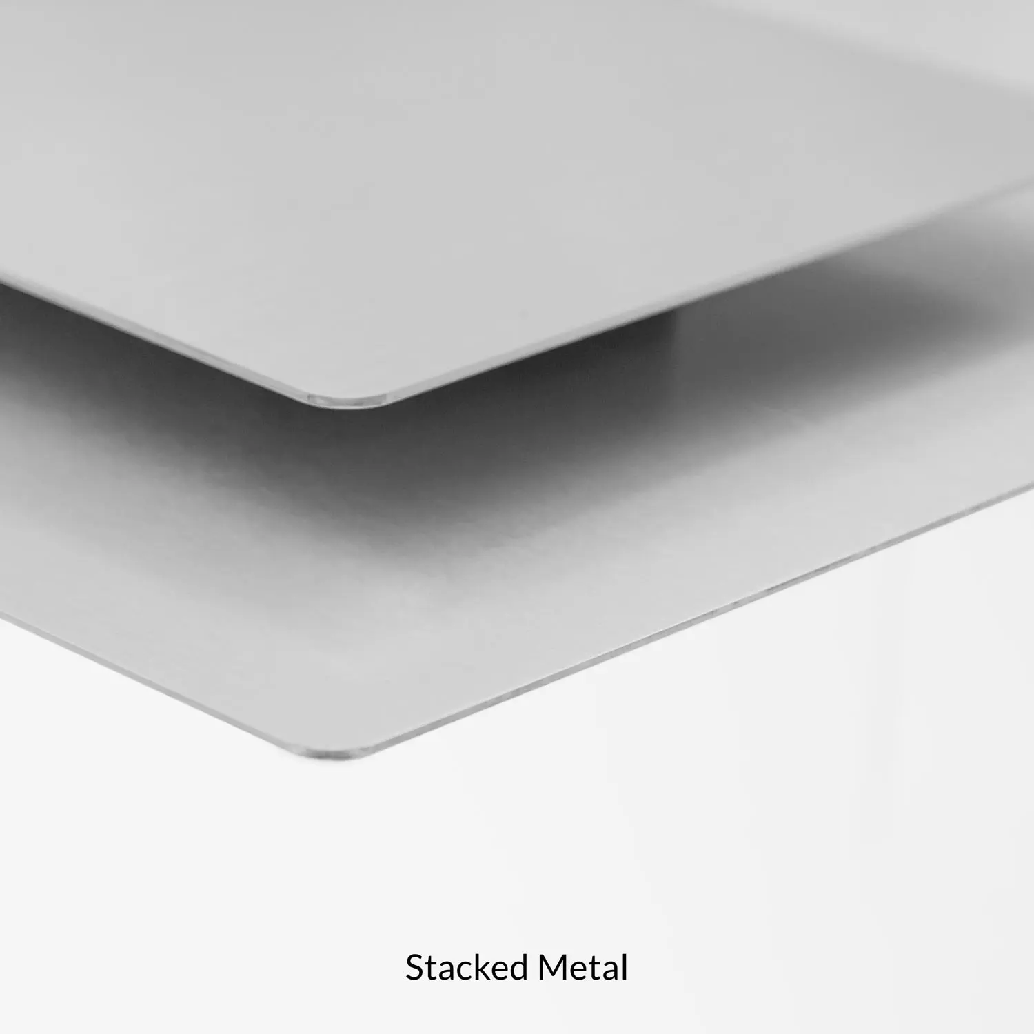 Closeup of stacked metal photo prints