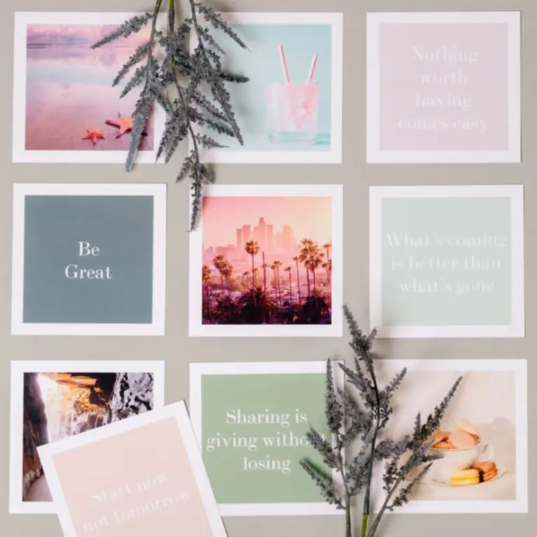 Tabletop with 9 Dutch & Deckle Gratitude cards with inspirational quotes and images printed on cards