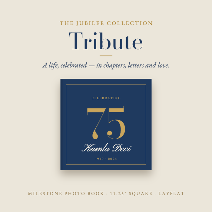 Tribute milestone photo book by Nostalo, with a navy cover and a gold number 75