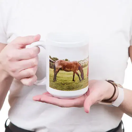 Lady holding a 15 oz personalized photo mug