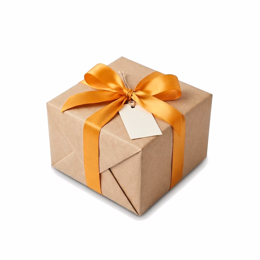 Kraft paper gift box tied with an orange ribbon