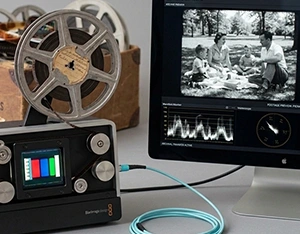 8mm and Super 8 home movie film being processed for digital transfer at The Camera Shop in St. Cloud, MN