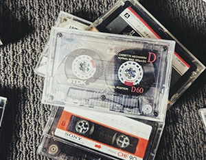 Audio cassette tape being converted to digital audio file at Linhoff Photo
