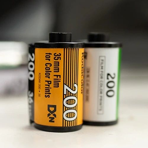 35mm color film rolls on a table — color C41 film developing in Knoxville TN