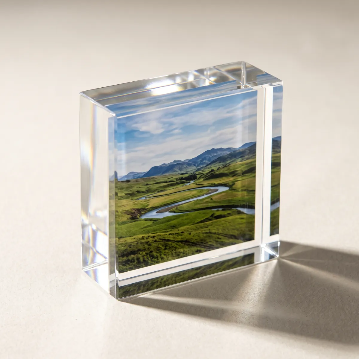 Clear acrylic photo block with a color landscape photograph printed inside.
