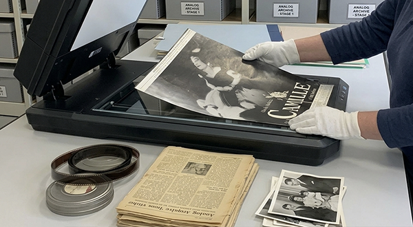 Archival storage shelves representing secure long-term digital and physical preservation