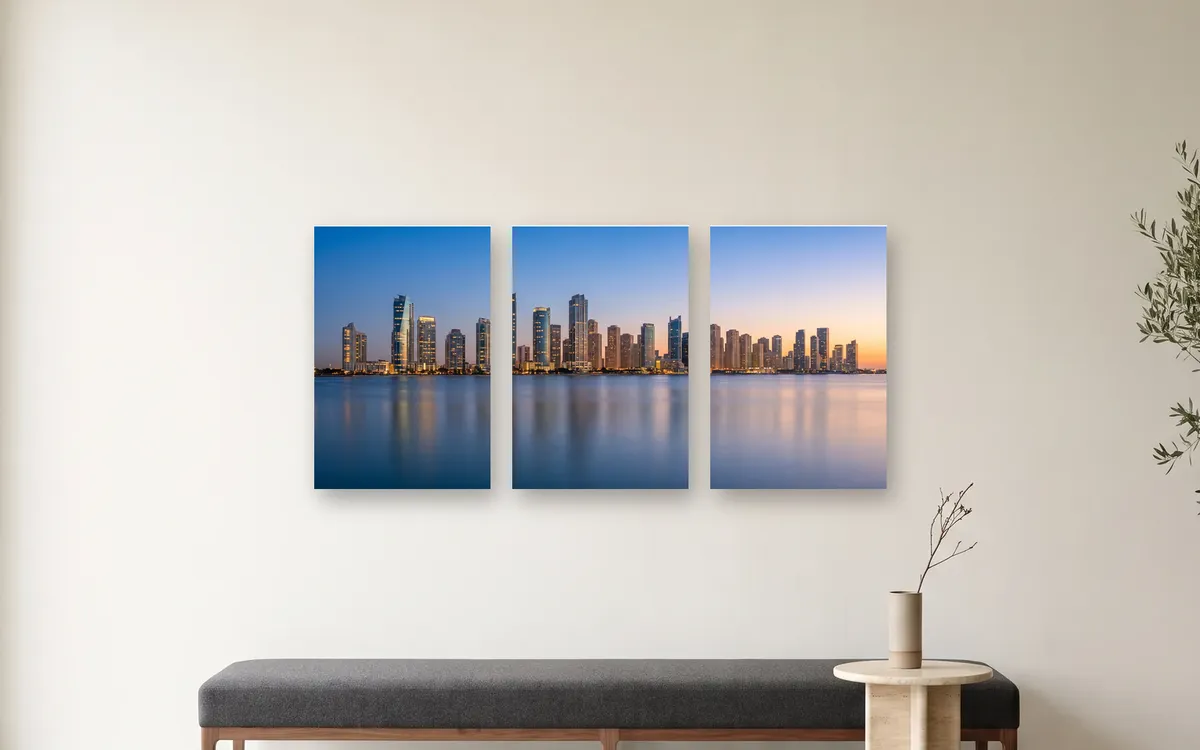 Three TilePix glass panels with one city skyline across them in a lobby
