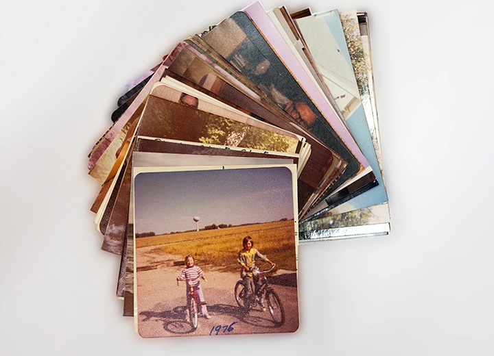 Collection of church photos and printed records ready for commercial archiving