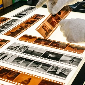 35mm film negatives with date and number markings — The Camera Shop St. Cloud, MN