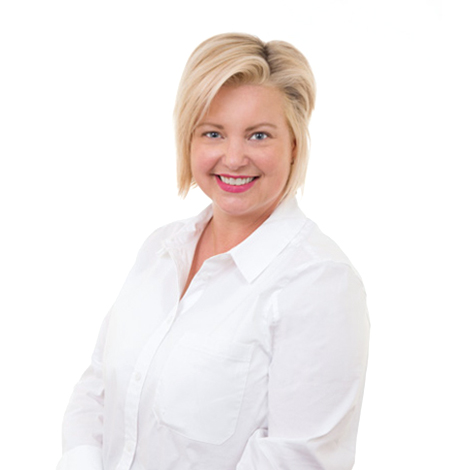 Headshot of Emily Erfman, Harold's Photo Director of Operations