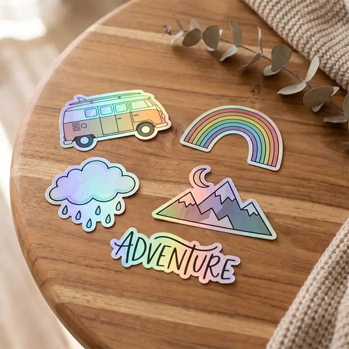 Custom holographic stickers on a wood table