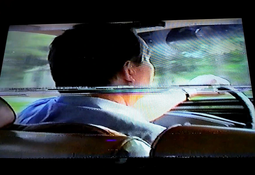 Horizontal lines and signal interference visible during playback of a deteriorating VHS tape — The Camera Shop St. Cloud, MN
