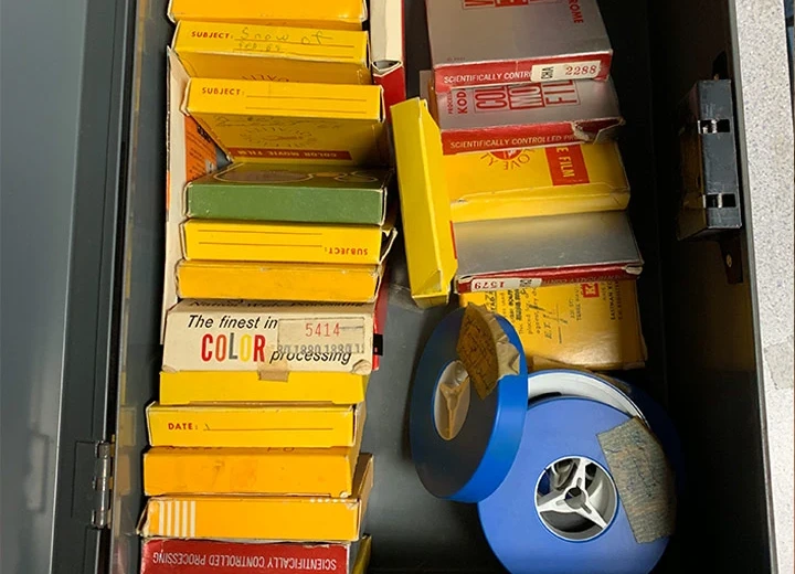 Old film reels and video tapes from a church archive awaiting digitization