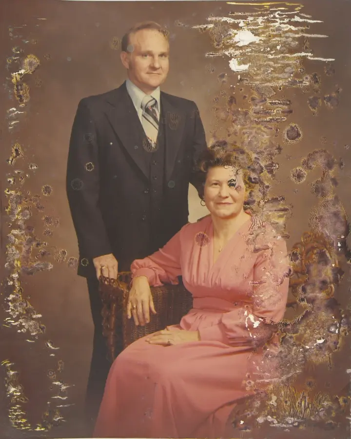 Damaged old family photograph before professional photo restoration at National Photo in Maryland