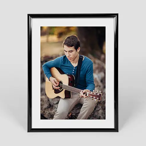 Vertical single image poster in black frame 18x24