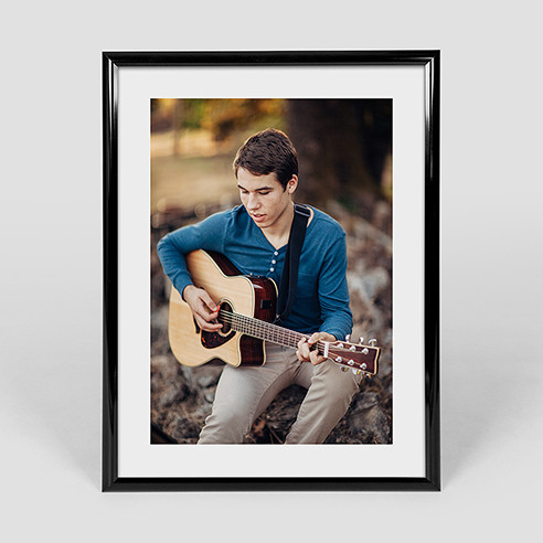 18x24 vertical poster in black frame