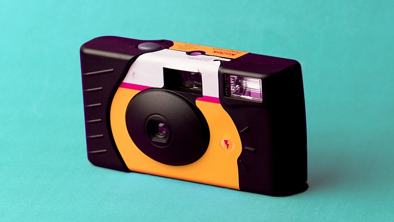 Disposable camera, negatives, and prints