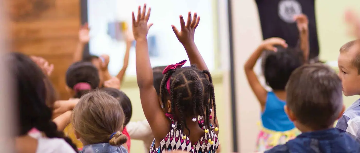 Children raising hands