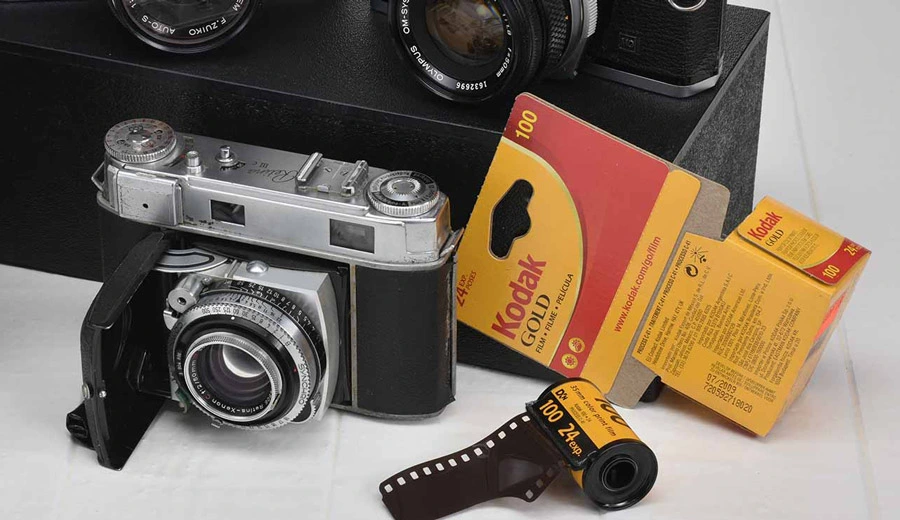 Film camera with film roll box