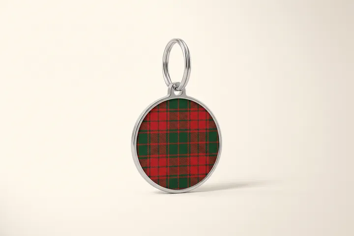 Round metal pet tag with a tartan face
