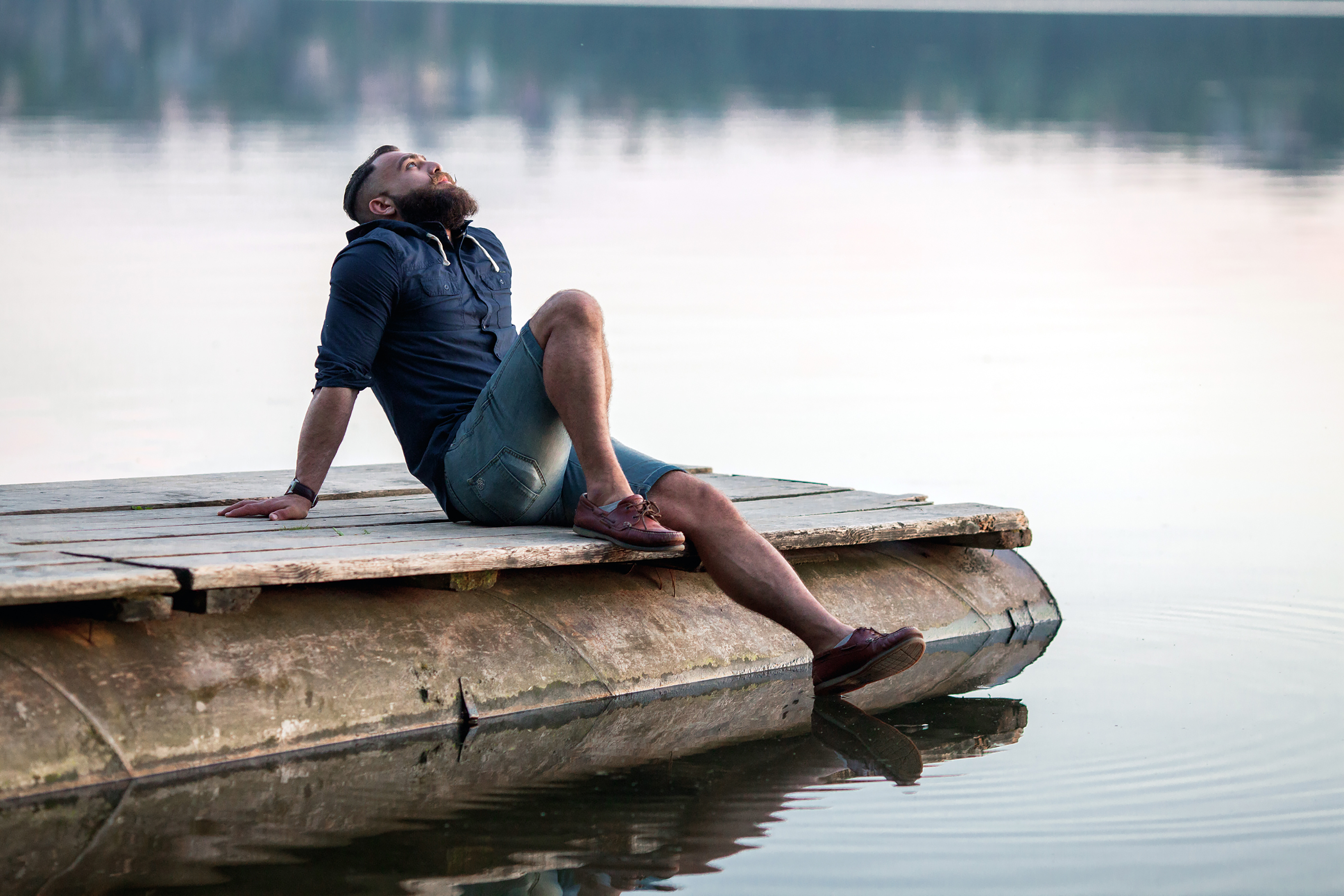 Man Sitting on the dock for self care