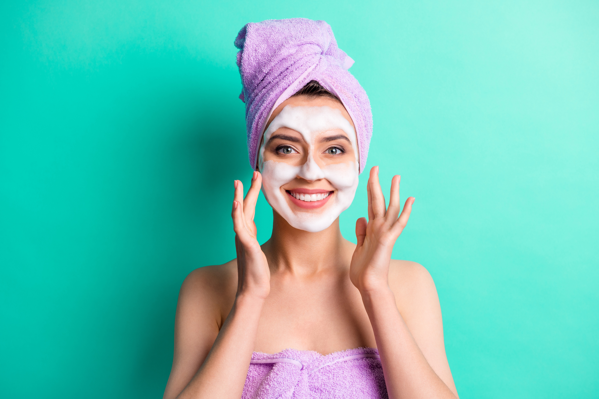 A person doing a self-care routine before they get into the shower. 