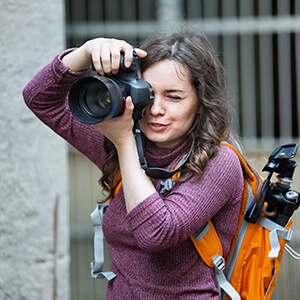 Photographer working with camera