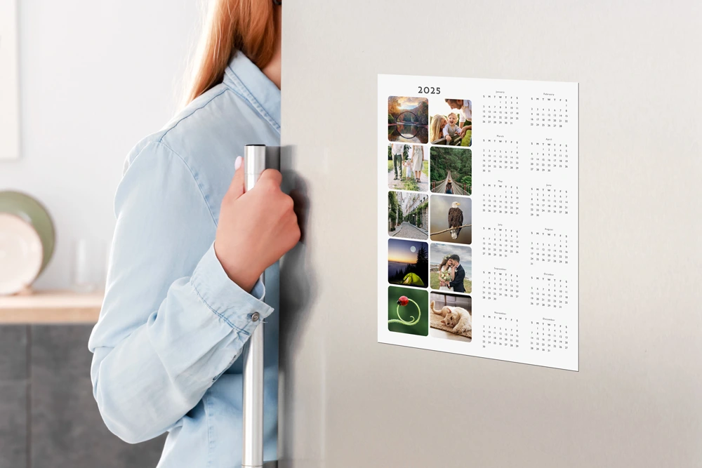 Photo magnet calendar on a fridge door