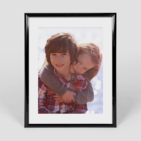 16x20 vertical poster in black frame