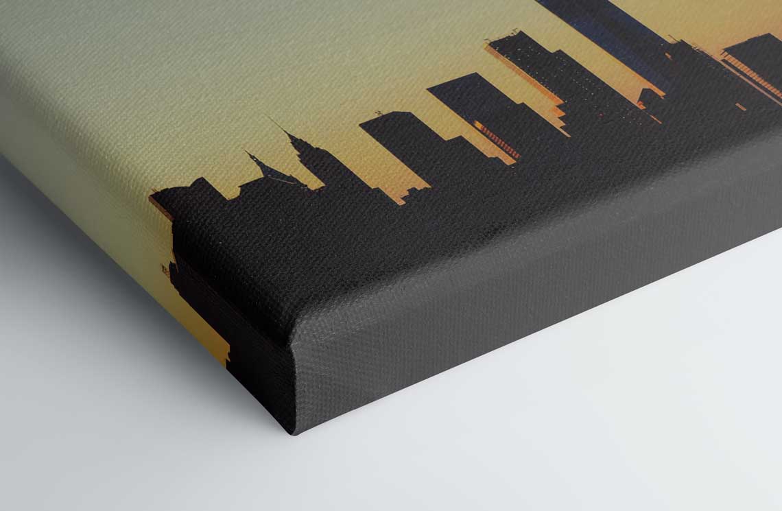 Wrapped canvas of city skyline silhouette at sunset